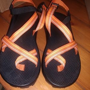 Black Chacos with orange straps. Size 12.